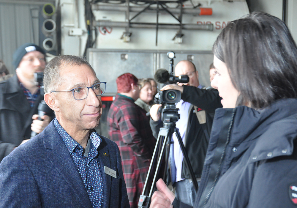 Bill Chapman, Highway 3 Twinning Development Association president, speaks with Alberta Premier Danielle Smith during the government's announcement recommitting to the $150 million 46-kilometre Taber to Burdett twinning project on Nov. 25. The project was first announced by the government in July 2020 with completion scheduled for 2023. | Alex McCuaig photo