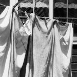 Hanging laundry on the farm was a pleasant task for most of the year, but then came winter. | Photo supplied by Alma Barkman