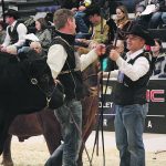 There were fist bumps between the reserve, left, and grand champion bull winners during the national Gelbvieh show at Canadian Western Agribition. Royal Western Gelbvieh from Red Deer County, Alta., showed the reserve, and Fladeland Livestock from Gladmar, Sask., showed the winner. | Karen Briere photo