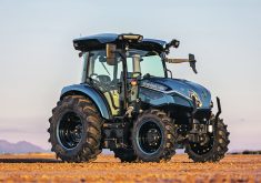 The T4 Electric Power tractor has an electric engine powered by a 75 kilowatt battery and is suited for livestock operations, including loader work, municipality, and orchard applications. |  CNH photo