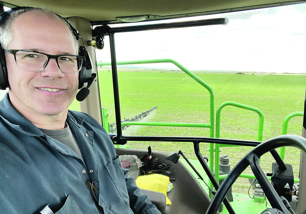 Although they are only a small fraction of Canada's population, farmers must help feed the world in a high technology, high stakes game," says Alberta Wheat Commission chair Greg Sears. | Alberta Wheat Commission photo