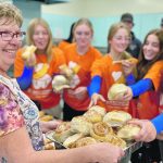 Charlotte Shewchuk’s home-made cinnamon buns and long johns fly out of the kitchen at Montmartre School. | Christalee Froese photo