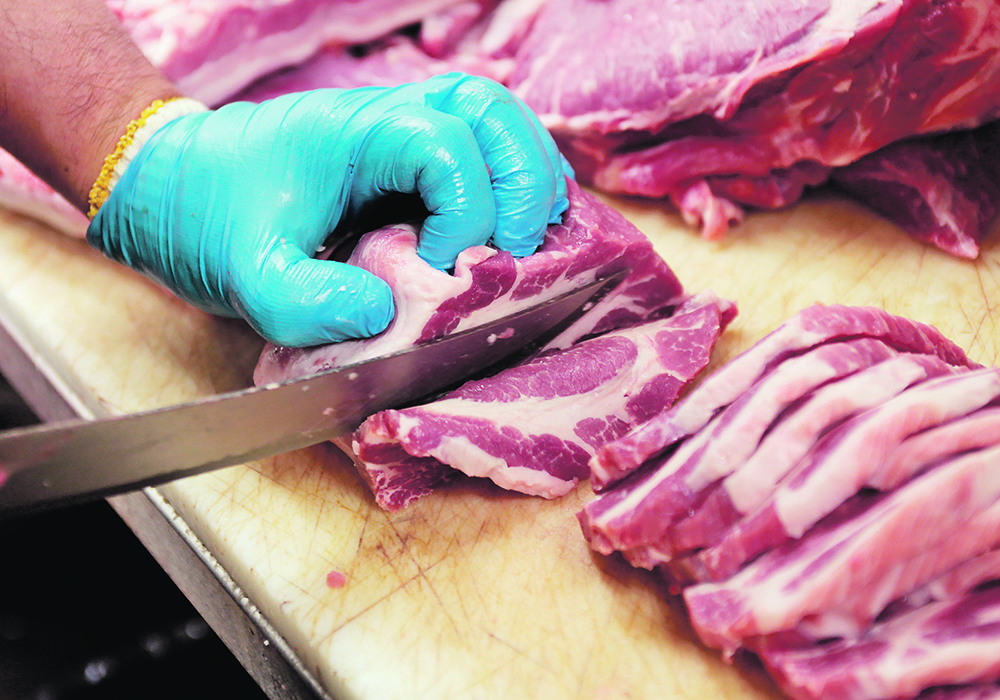 The pork industry is told it must focus on the “characteristics of better eating attributes,” including marbling, colour, higher water-holding capacity and tenderness.  |  Reuters/ Hyungwon Kang photo