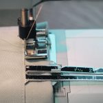 From the top of the original hem on the pants, three-quarters of an inch was measured up and the pants were folded along this line. The pants are then stitched along the edge of the original hem. A zipper foot and moving the needle to the left help to do this. | Betty Ann Deobald photo