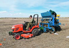 A plot drill is used to seed green field peas and apply fertilizer treatments in a phosphorus forms, rates and placement study in May 2022.  | Blake Weiseth photo