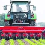 The hoe-type IC-Weeder AI cultivates between rows and also between target plants within the row. Cameras are mounted under the cover to produce the most accurate control instructions for the blades. This allows the blades to hoe within two centimetres of crop plants. | Lemken photo