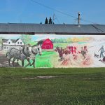 A mural found on the main street of Oak River, Man., shows off the lives of farmers when the region was first settled by Europeans. | Joan Airey photo