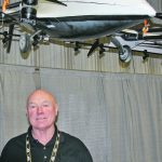 Don Campbell had his ROGA U7AG drone suspended from the ceiling above his booth at Manitoba Ag Days. He said drone technology is mature, and the technology can already provide farmers a return on their investment. | Ron Lyseng photo
