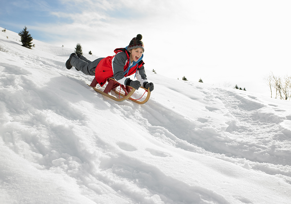 I grew up on a ranch across the road from a horse pasture with a sharp rise in elevation at the south end that we called Green’s Hill. The eastern slope of that hill was perfect for tobogganing, and we spent a lot of time every winter trying to get to the bottom as fast as possible. | Getty Images