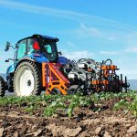 The Vulcan uses computer vision and robotic cutting arms to reach in between vegetable plants and till weeds with sub-inch accuracy. | FarmWise photo
