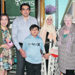 Umber Naushen, second from right, a Rural and Northern Immigration Pilot candidate, emigrated from Pakistan with her family through RNIP and arrived in Claresholm, Alta., in January 2022. She’s seen here with her spouse, Muhammud Tariq Maqsood, second from left, their youngest son, Muhammad Sameed, Roan Santos, left, a settlement counselor with Willow Creek Immigrant Services, a project of the Calgary Catholic Immigration Society, and Marie Schooten, right, volunteer co-ordinator with the WCIS. | Photo supplied by Lisa Degenstein
