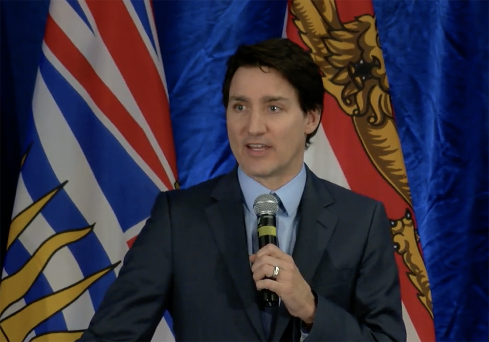 Speaking to farmers gathered at the Canadian Federation of Agriculture annual meeting March 6 — a surprise late addition to the agenda — the prime minister praised farmers for their hard work and outlined government initiatives to help them deal with the urgent issue of climate change. | Screencap via cfa-fca.ca
