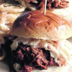 Pulled pork on a bun with coleslaw is a great casual meal. Serve with a side of fries or onion rings. | Sarah Galvin photo