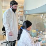 Tony Ruzzini of the University of Saskatchewan’s Western College of Veterinary Medicine, seen here with Poonam Dhindwal, says an enzyme that can deactivate medication was found in a feedlot watering bowl, but the problem might extend beyond cattle to other types of livestock. | Photo supplied by Tony Ruzzini