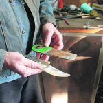 An old straw chopper blade from a John Deere combine will be turned into a bush knife. | Duane McCartney photo