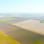 Aerial photo of checkerboard prairie farmland.