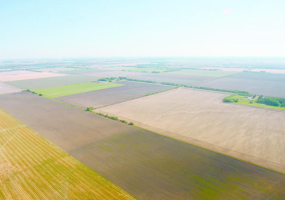 Aerial photo of checkerboard prairie farmland.