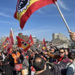 Striking members of the Public Service Alliance of Canada from Ontario and Quebec meet on the Portage Bridge in Ottawa.