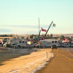 Vehicles block the highway at Coutts, Alberta as part of the protest over COVID travel restrictions.