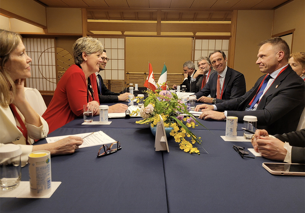 Canadian federal agriculture minister Marie Claude-Bibeau sits at a table with other G7 ag ministers at a meeting in Japan recently.