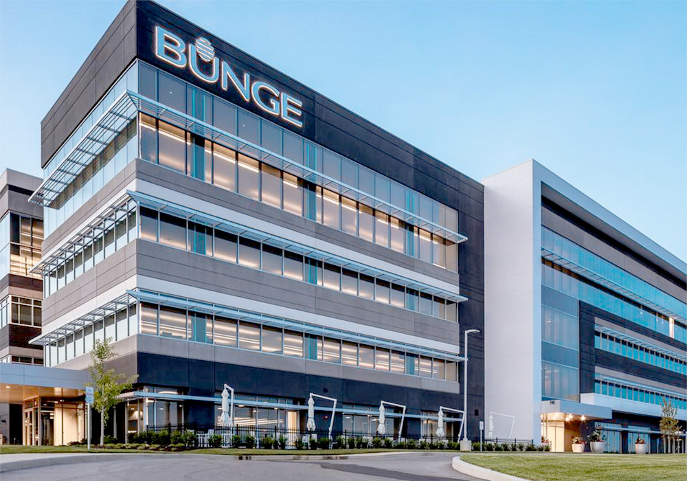 A photo of a Bunge office building with the company name on one side of the building near the roof.