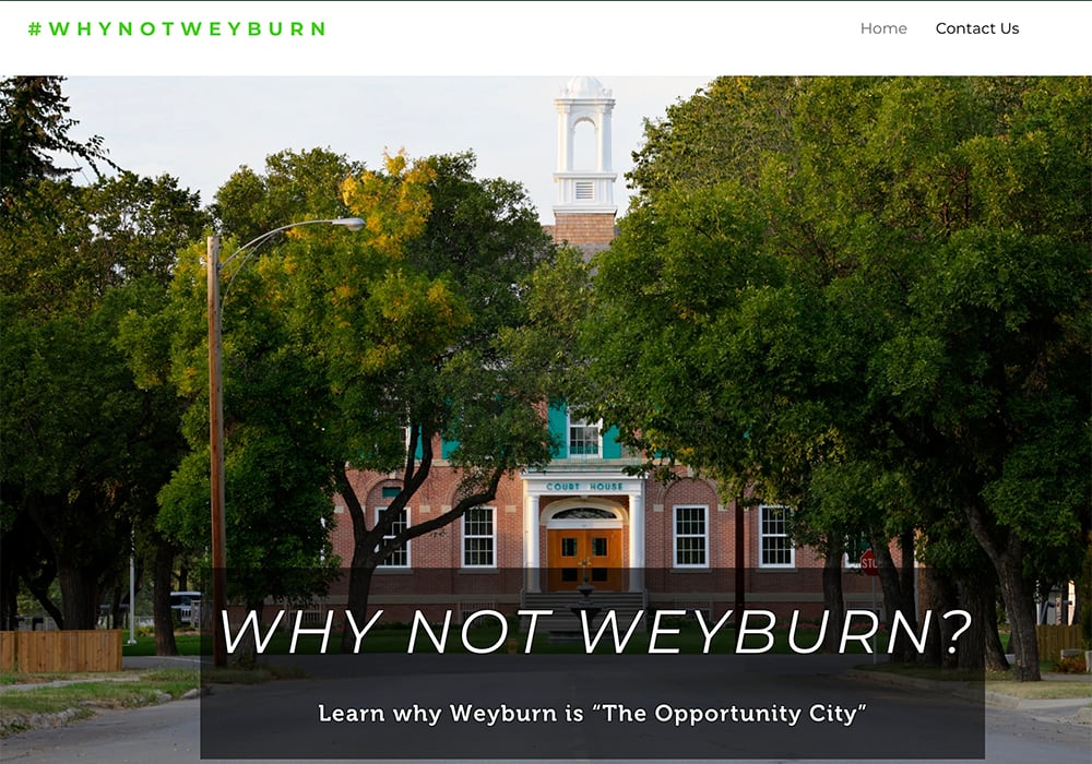 A screencap of the "Why not Weyburn?" website featuring the facade of the southeast Saskatchewan city's historic old courthouse framed by lush, green trees.
