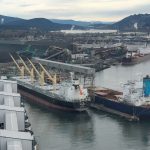 An aerial view of container ships at the dock in the Port of Vancouver.