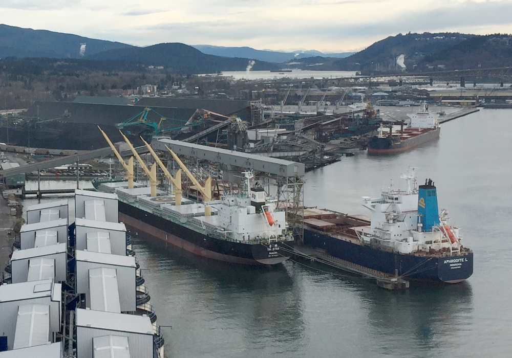 An aerial view of container ships at the dock in the Port of Vancouver.