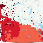 A map of western Canada showing most of the Prairie provinces covered in red, indicating a warmer than normal summer forecast.