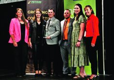 Sarah Leguee, left, Stephanie Leguee, Jake Leguee, Erik Nikolejsin and Amber Nikolejsin from Leguee Farms at Weyburn were named Saskatchewan’s Outstanding Young Farmers for 2023. At right is Shannon Weatherall, Farm Credit Canada’s senior vice-president of prairie operations, who announced the winners at Canada’s Farm Show.  |  Karen Briere photo