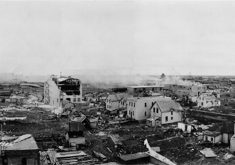 An archival, aerial, black and white photo showing some of the damage caused by the "Regina Cyclone" in 1912.