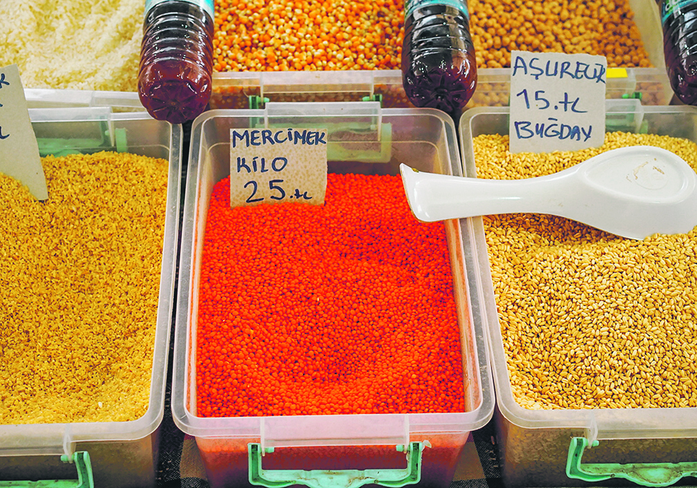 A colourful variety of lentils are offered for sale in a market in Turkey.