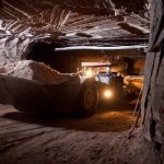 A loader hauls potash underground.