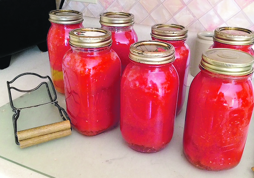 Many consumers are responding to recent food inflation by preserving their own food, such as these canned tomatoes.  |  Alma Barkman photo