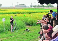 Emily Cline explains her research during a recent field day at the Canada-Saskatchewan Irrigation Diversification Centre.  |  Braedyn Wozniak photo