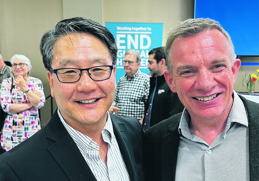 Canadian Foodgrains Bank chair Ken Kim, left, and executive director Andy Harrington were all smiles at the organization’s 40th anniversary celebration.  |  Ed White photo