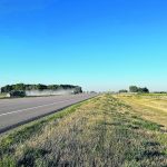 The stretch of Highway 3 between Medicine Hat and Taber, Alta., has increasingly become a safety issue as personal and commercial traffic often competes with combines, sprayers, cattle liners and trucks servicing processors, feedlots, greenhouses and potato and sugar beet operations. | Alex McCuaig photo