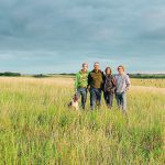 The Mappin family standing in a field.