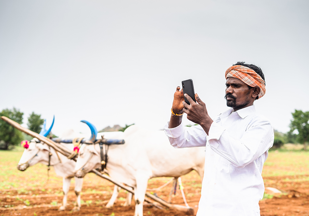 Indian farmers can see what other farmers and agronomists are doing on their smartphones. | Getty Images