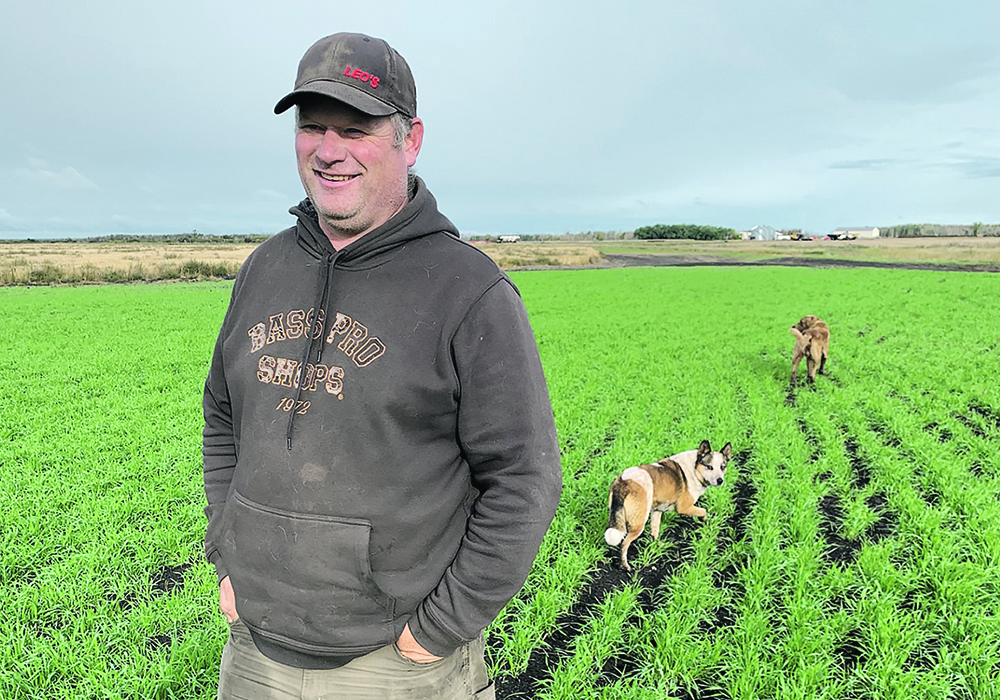 Curtis McRae stands in his first rye crop on his farm near Rockwood, Man. He wants to sell the crop into the rye whisky market.   |   Ed White photo