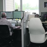 Teachers at work in the Sask DLC head office in Kenaston, Sask. | Distance Learning Corp. photo
