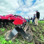 Farmers check out one of the cover crops tillage demonstration machines at Canada’s Outdoor Farm Show in Woodstock, Ont. | Diana Martin photo