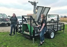 University of Guelph associate professor Dr. Katie Wood, left, and master&rsquo;s student Katie Kroeze are on the Beef at Guelph research team that uses the GreenFeed pasture-based enteric methane monitoring equipment. |  Stew Slater photo