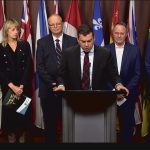 Keith Currie, left, president of the Canadian Federation of Agriculture, Jennifer Babcock, government and public affairs for the Canadian Cattle Association, Jan VanderHout, president of the Fruit and Vegetable Growers of Canada, Rick White, president the Canadian Canola Growers Association and Kyle Larking, executive director of Grain Growers of Canada, listen as Kody Blois, chair of the House Commons agriculture committee, talks about his new private member's bill at an Oct. 19 news conference. | Screen capture image
