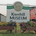 The project will construct a building to link the museum’s agricultural shed to the main museum and help it move to year-round operation. | Screencap via kneehillmuseum.weebly.com