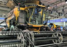 New Holland’s new CR11 combine showcases a significant boost in processing capacity but with the same weight and width as previous models.  |  John Greig photo