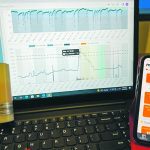 Bolus data on a computer screen shows the temperature change every time an animal drinks water, as seen in the top chart, and a spike in activity typical of an estrus alert. | Photo supplied by Susan Markus
