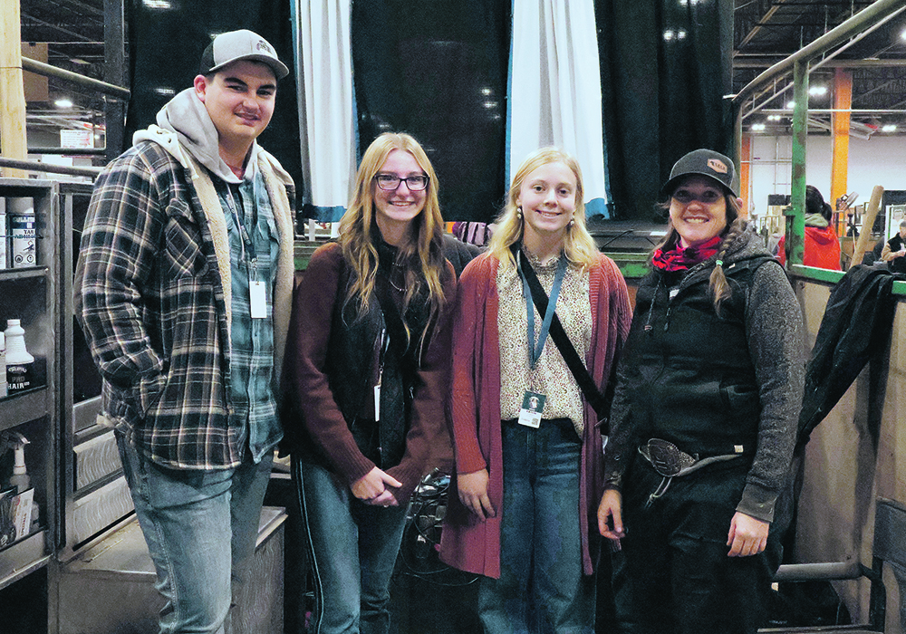 High schoolers from Iowa got hands-on journalism experience interviewing Canadian livestock producers at Canadian Western Agribition. Pictured: Jake VanderHeiden, Hannah Grantz and Katlin Truelsen with Lexie Girodat of Rocking G Land and Cattle out of Gull Lake, Sask.  |  Becky Zimmer photo