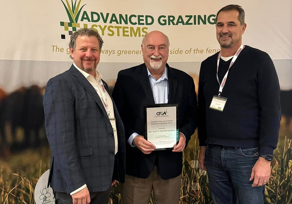 Dr. Dan Undersander, middle, is the 2023 winner of the Canadian Forage and Grasslands Association Leadership Award. He is joined by Cedric MacLeod, executive director of CFGA, left and Eric Boot, right, chair, international exporters of CFGA. | Catherine Brown photo
