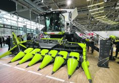 Claas’ partial electric drive for combines uses its diesel engine to charge the electric system while under regular load, which is then ready to kick in during the next high-demand period.  |  John Greig photo